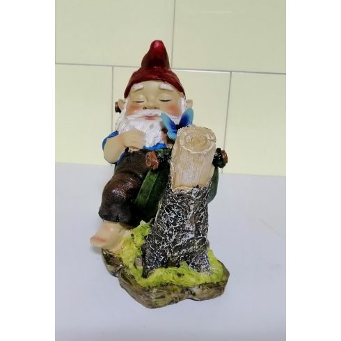 Kerti törpe-19cm-fatörzsek közötti függőágyban pihenő